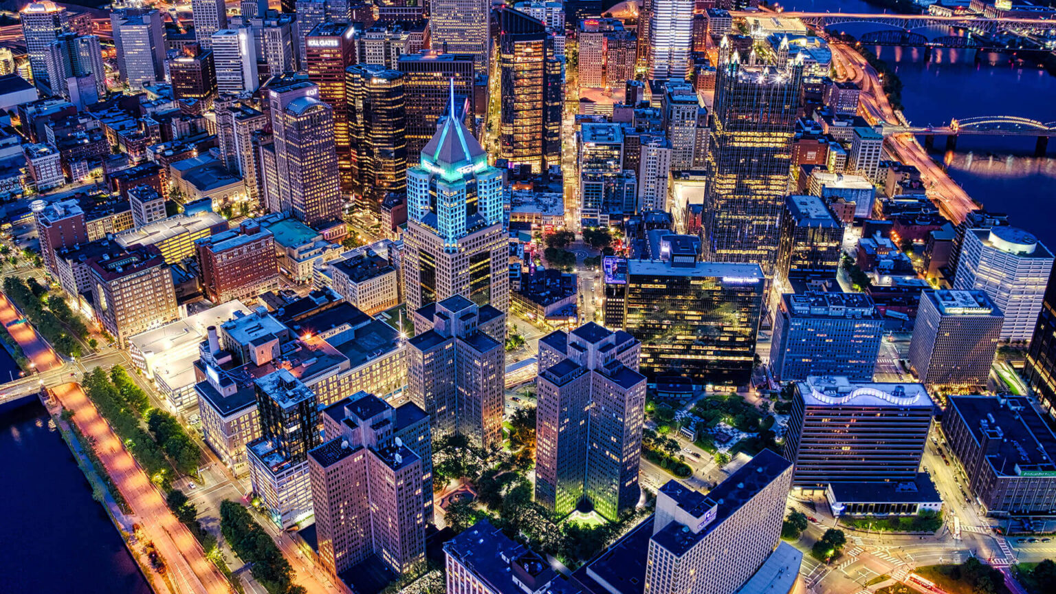 A night time, aerial shot of down town Pittsburgh.