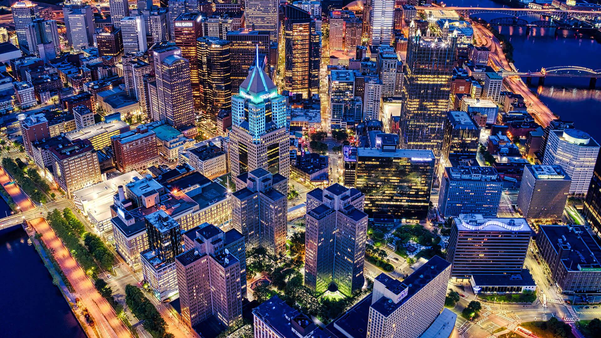 A night time, aerial shot of down town Pittsburgh.