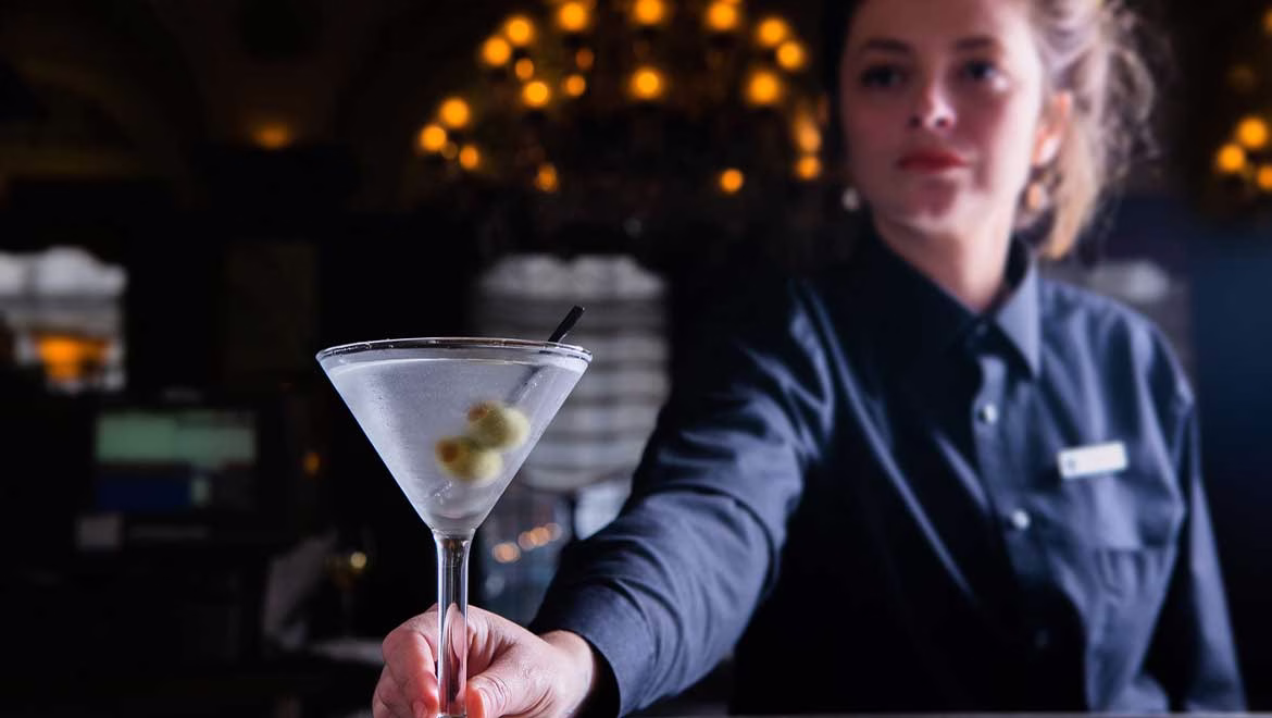 Woman serving a martini
